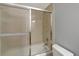 This bathroom features a tub and shower combination and a standard toilet at 4471 Atwood Cay Cir # 13, Sarasota, FL 34233