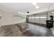 Clean, spacious garage with high ceilings, utility sink, storage, and an automatic door at 4471 Atwood Cay Cir # 13, Sarasota, FL 34233