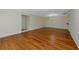 Spacious living room with hardwood floors and neutral wall color at 4471 Atwood Cay Cir # 13, Sarasota, FL 34233