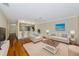 Cozy living room with modern decor, kitchen pass-through, and comfortable seating at 4471 Atwood Cay Cir # 13, Sarasota, FL 34233