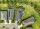 An aerial view of houses with well-maintained lawns, landscaping, and private pools at 4542 Cedar Brush Ter, Sarasota, FL 34243
