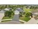Charming single-Gathering home with manicured lawn, and mature palm trees, offering great curb appeal at 4542 Cedar Brush Ter, Sarasota, FL 34243