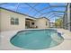 Backyard pool with a spacious deck and serene outdoor seating, ideal for relaxation and entertaining guests at 4542 Cedar Brush Ter, Sarasota, FL 34243