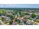 Overhead view of the house near a golf course and a small pond in a suburban community at 5126 15Th W Ave, Bradenton, FL 34209