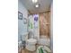Charming bathroom with cartoon shower curtain, bathtub, and toilet at 5126 15Th W Ave, Bradenton, FL 34209