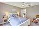 Bedroom with a ceiling fan, side table, and a rocking chair, perfect for relaxing at 5126 15Th W Ave, Bradenton, FL 34209
