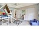 bedroom with a slide and play area, creating a fun and adventurous space at 5126 15Th W Ave, Bradenton, FL 34209
