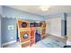 Charming bedroom featuring a bunk bed, cool paint, and ample closet space at 5126 15Th W Ave, Bradenton, FL 34209