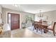 Elegant dining room featuring a chandelier, lots of natural light, and plenty of space to gather at 5126 15Th W Ave, Bradenton, FL 34209
