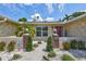 Inviting front entrance with decorative pineapple accents, manicured landscaping, and charming curb appeal at 5126 15Th W Ave, Bradenton, FL 34209