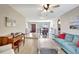 Spacious open-concept living and dining area, featuring light wood floors and lots of natural light at 5126 15Th W Ave, Bradenton, FL 34209