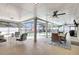 Patio with dining area and sitting area overlooking fenced in pool at 5126 15Th W Ave, Bradenton, FL 34209