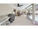 The screened in patio features an outdoor kitchen and dining area at 5126 15Th W Ave, Bradenton, FL 34209