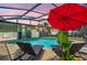 Beautiful pool with lounge chairs, and screened lanai at 5126 15Th W Ave, Bradenton, FL 34209