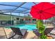 Beautiful pool with lounge chairs, and screened lanai at 5126 15Th W Ave, Bradenton, FL 34209