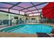 Beautiful pool with lounge chairs, and screened lanai at 5126 15Th W Ave, Bradenton, FL 34209