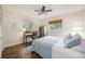 Bedroom with a desk, ceiling fan, and plenty of natural light at 5204 24Th E Ave, Palmetto, FL 34221