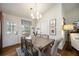 Cozy dining area with views of the backyard, connected to the living room at 5204 24Th E Ave, Palmetto, FL 34221