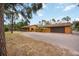 Beautiful ranch-style home with an attached garage, featuring a brick driveway at 5204 24Th E Ave, Palmetto, FL 34221