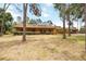 Charming single-story home with a welcoming front porch and well-maintained landscaping at 5204 24Th E Ave, Palmetto, FL 34221