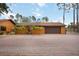 Detached garage with brick pavers and landscaping at 5204 24Th E Ave, Palmetto, FL 34221