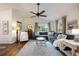 Spacious living room with large sectional sofa and decorative pillows at 5204 24Th E Ave, Palmetto, FL 34221