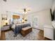 Comfortable main bedroom with hardwood floors, a ceiling fan, and natural light, creating a relaxing retreat at 5204 24Th E Ave, Palmetto, FL 34221
