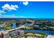 Beautiful aerial view showcasing the city skyline, waterway, and building in a coastal setting at 5561 Cannes Cir # 5101, Sarasota, FL 34231