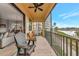 Relax on your spacious outdoor balcony with patio furniture and waterfront views of nature at 5561 Cannes Cir # 5101, Sarasota, FL 34231