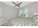 Neutral bedroom with a queen bed and a ceiling fan at 5561 Cannes Cir # 5101, Sarasota, FL 34231