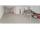 Spacious two car garage with epoxy floor and additional room for storage at 5561 Cannes Cir # 5101, Sarasota, FL 34231