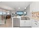 Gourmet kitchen featuring a stainless steel sink and modern stainless steel appliances at 5561 Cannes Cir # 5101, Sarasota, FL 34231