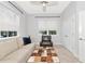 Inviting living room featuring comfortable seating, natural light, and a stylish decor at 5561 Cannes Cir # 5101, Sarasota, FL 34231