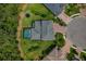 Aerial view of a large home with screened pool and spacious fenced backyard at 5805 49Th E Ct, Ellenton, FL 34222