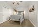Bedroom featuring neutral colored decor and a view of the closet and a deer head mount at 5805 49Th E Ct, Ellenton, FL 34222