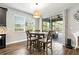 Cozy dining area, with natural light and slider doors to covered patio at 5805 49Th E Ct, Ellenton, FL 34222