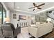 Inviting living room showcases wood-look tile flooring and plenty of natural light at 5805 49Th E Ct, Ellenton, FL 34222
