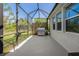 The covered patio offers ample space for outdoor dining, relaxation, and entertainment, features a built-in BBQ grill at 5805 49Th E Ct, Ellenton, FL 34222