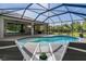 Captivating pool area with clear water and outdoor lounge, perfect for relaxation and enjoyment at 5805 49Th E Ct, Ellenton, FL 34222