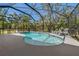 Stunning screened-in pool with clear blue water and comfortable lounge chairs on the patio at 5805 49Th E Ct, Ellenton, FL 34222