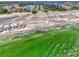Panoramic aerial view of a beach resort with beachfront condos and pristine ocean waters at 5858 Midnight Pass Rd # 27, Sarasota, FL 34242