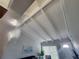 High ceiling with white beams in the living room at 5858 Midnight Pass Rd # 27, Sarasota, FL 34242