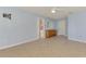 Bedroom with tiled floor, ceiling fan, a dresser, and a mirror at 6011 91St E St, Bradenton, FL 34202