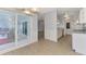 Open dining and kitchen area with stainless appliances, recessed lighting, and tiled floors at 6011 91St E St, Bradenton, FL 34202