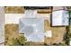 Aerial shot of roof, carport, driveway, backyard and neighborhood at 609 25Th W Ave, Bradenton, FL 34205