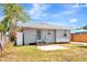 Back exterior view of home with small patio at 609 25Th W Ave, Bradenton, FL 34205