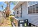 HVAC, electrical, and satellite dish on exterior of home at 609 25Th W Ave, Bradenton, FL 34205