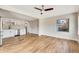 Inviting living space with kitchen featuring sleek countertops and a ceiling fan at 609 25Th W Ave, Bradenton, FL 34205