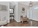 Bright foyer with stylish lighting, wood floors, and decorative accents, creating a welcoming entrance at 6102 9Th Avenue Cir Ne, Bradenton, FL 34212