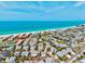 Aerial view showcasing residences in a beachfront community at 6250 Holmes Blvd # 63, Holmes Beach, FL 34217